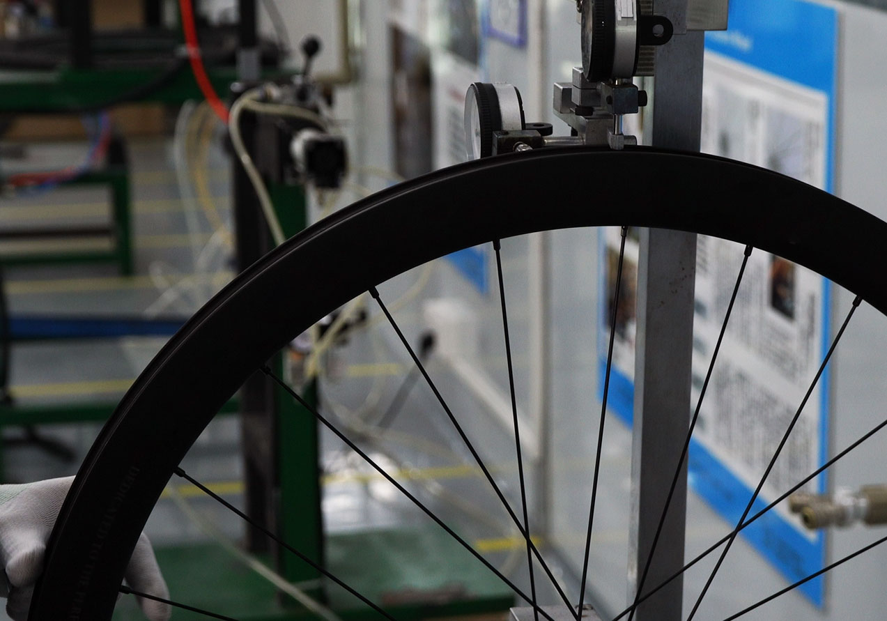 Wheel building and truing station